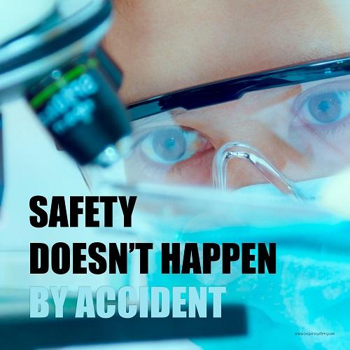 Safety poster of a close up of a woman's eyes wearing safety glasses inspecting a sample on a microscope with safety slogan written at the bottom.