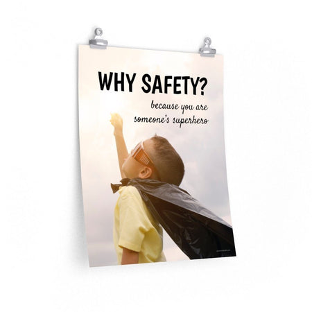 A workplace safety poster showing a young child with a makeshift cape and mask striking a superhero pose with the slogan why safety? because you are someone's superhero.