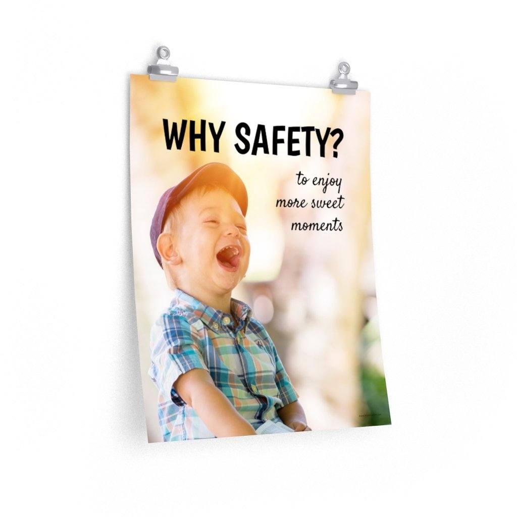 A workplace safety poster showing a young child laughing and smiling with whimsical camera flares around and the slogan why safety? to enjoy more sweet moments.