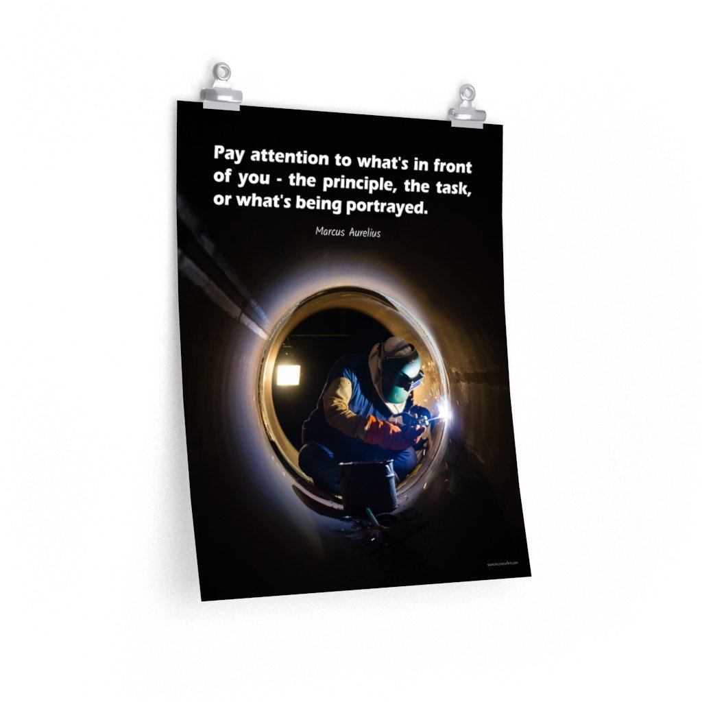 Safety poster of a welder in safety gear and hood sitting inside a large pipe; they are welding with bright sparks flying and a safety quote in white text at the top.