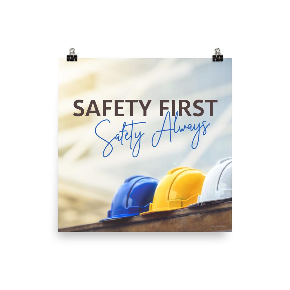 A workplace safety poster showing a white, a yellow, and a blue hardhat sitting on a wall with the slogan safety first, safety always.