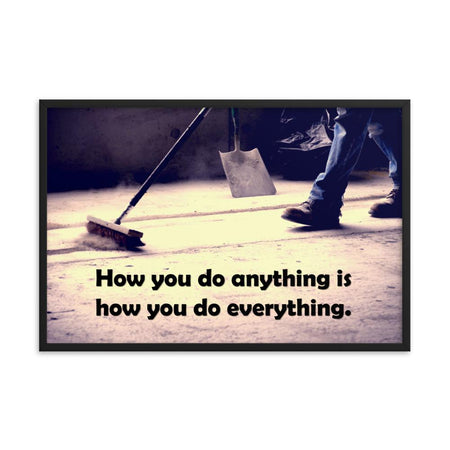 Safety poster showing a closeup of the ground where a warehouse or construction worker is sweeping the workshop floor and an encouraging safety slogan written in bold text.