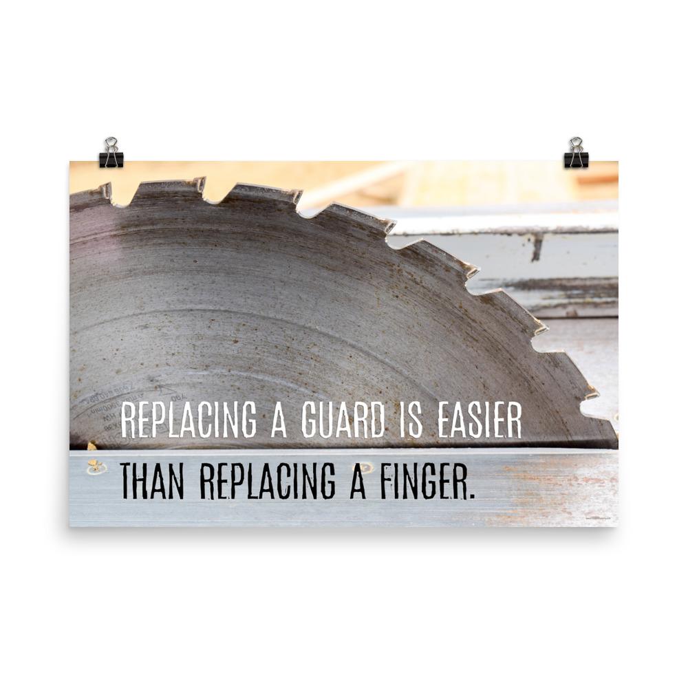 A workplace safety poster depicting a close up of a table saw blade in a workshop with a safety slogan on the bottom half of poster.