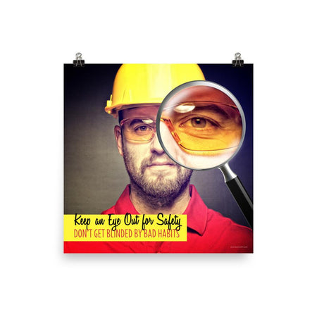 A workplace safety poster showing a portrait of a man wearing a hardhat and safety glasses with a magnifying glass magnifying one eye with the slogan, keep an eye out for safety, don't get blinded by bad habits.