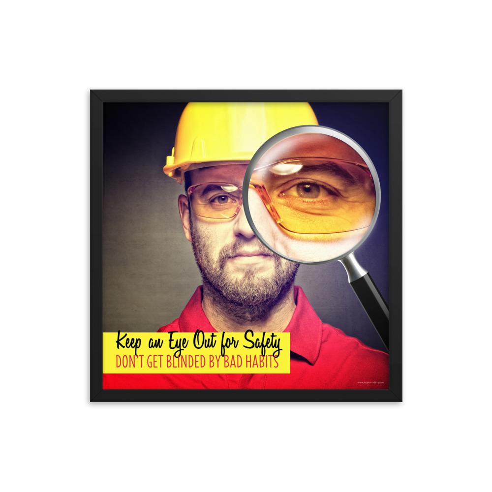A workplace safety poster showing a portrait of a man wearing a hardhat and safety glasses with a magnifying glass magnifying one eye with the slogan, keep an eye out for safety, don't get blinded by bad habits.