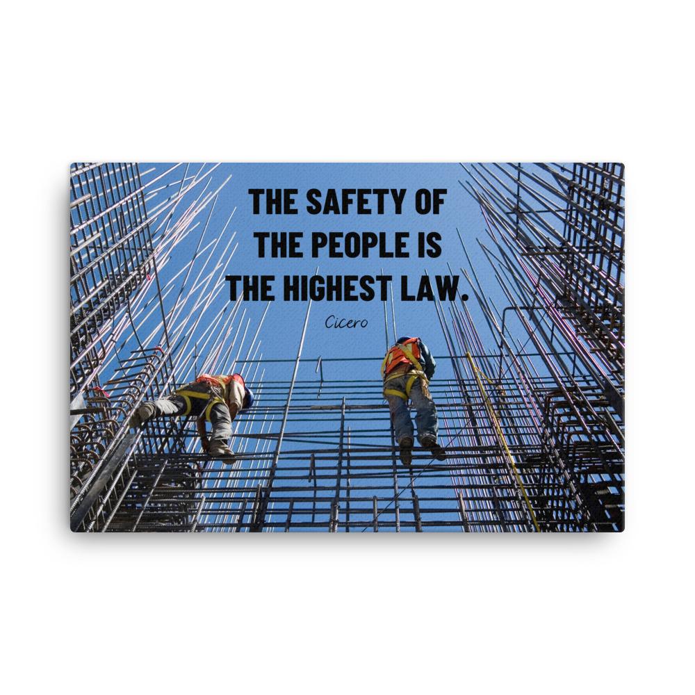 A safety poster showing construction workers scaling rebar with a bright blue sky as the background and a safety quote in black block text.