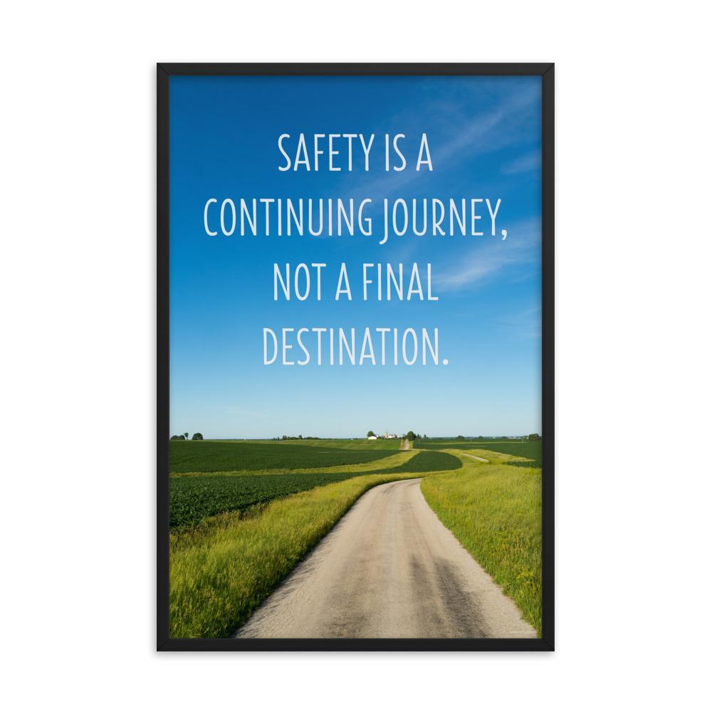 A workplace safety poster depicting a beautiful sunny day with a bright blue sky and a lush green field being cut down the middle by a dirt road leading off into the countryside with the text safety is a continuing journey, not a final destination.