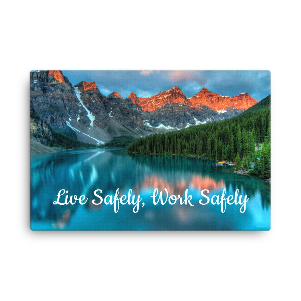 A workplace safety poster depicting a beautiful landscape of mountains with a river flowing down the side of the mountains into a bright blue pond with text saying live safely work safely.