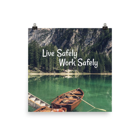 A workplace safety poster depicting a beautiful landscape of mountains in the background of a lake with a little wooden boat in the lake with text saying live safely work safely.