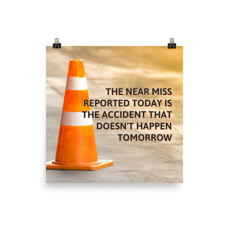 A workplace safety poster showing an orange safety cone with the slogan the near miss reported today is the accident that doesn't happen tomorrow.