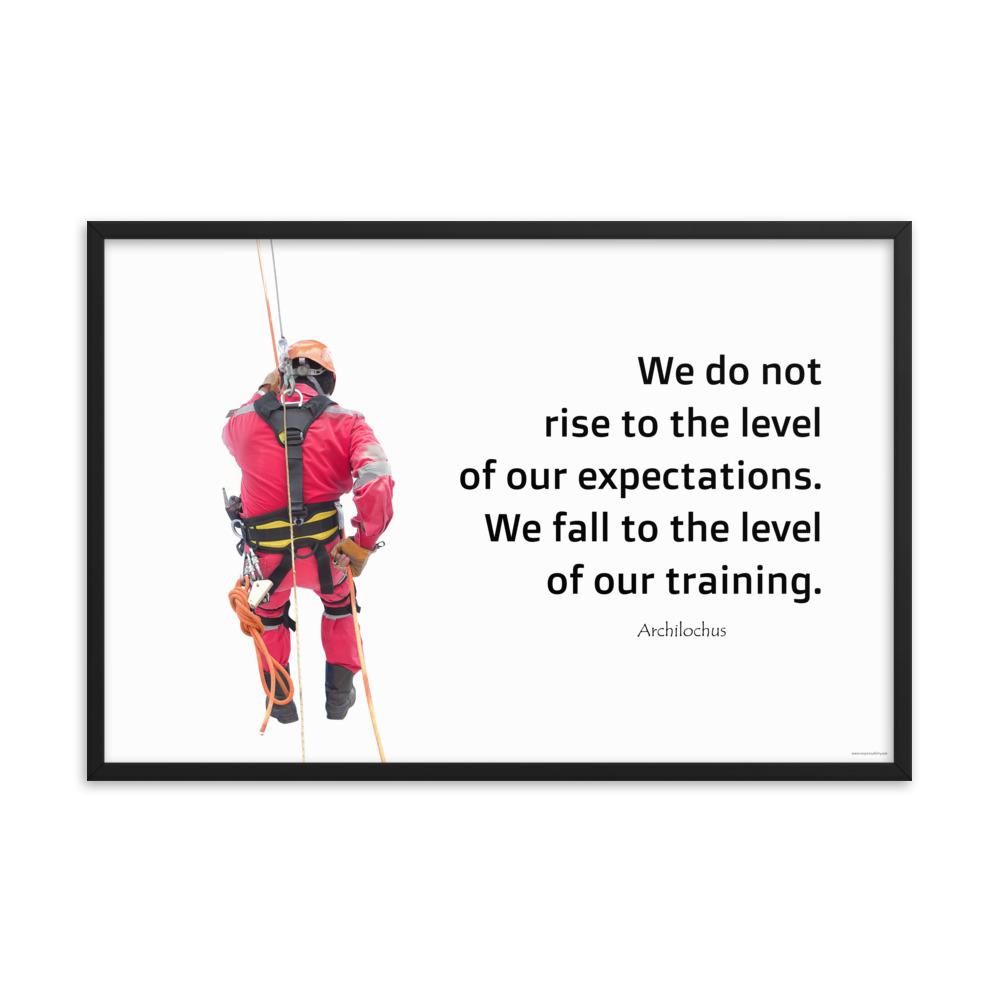 A safety poster showing a worker performing a controlled descent while wearing a fall protection harness on a bright white background with a quote from Archilochus to the right.