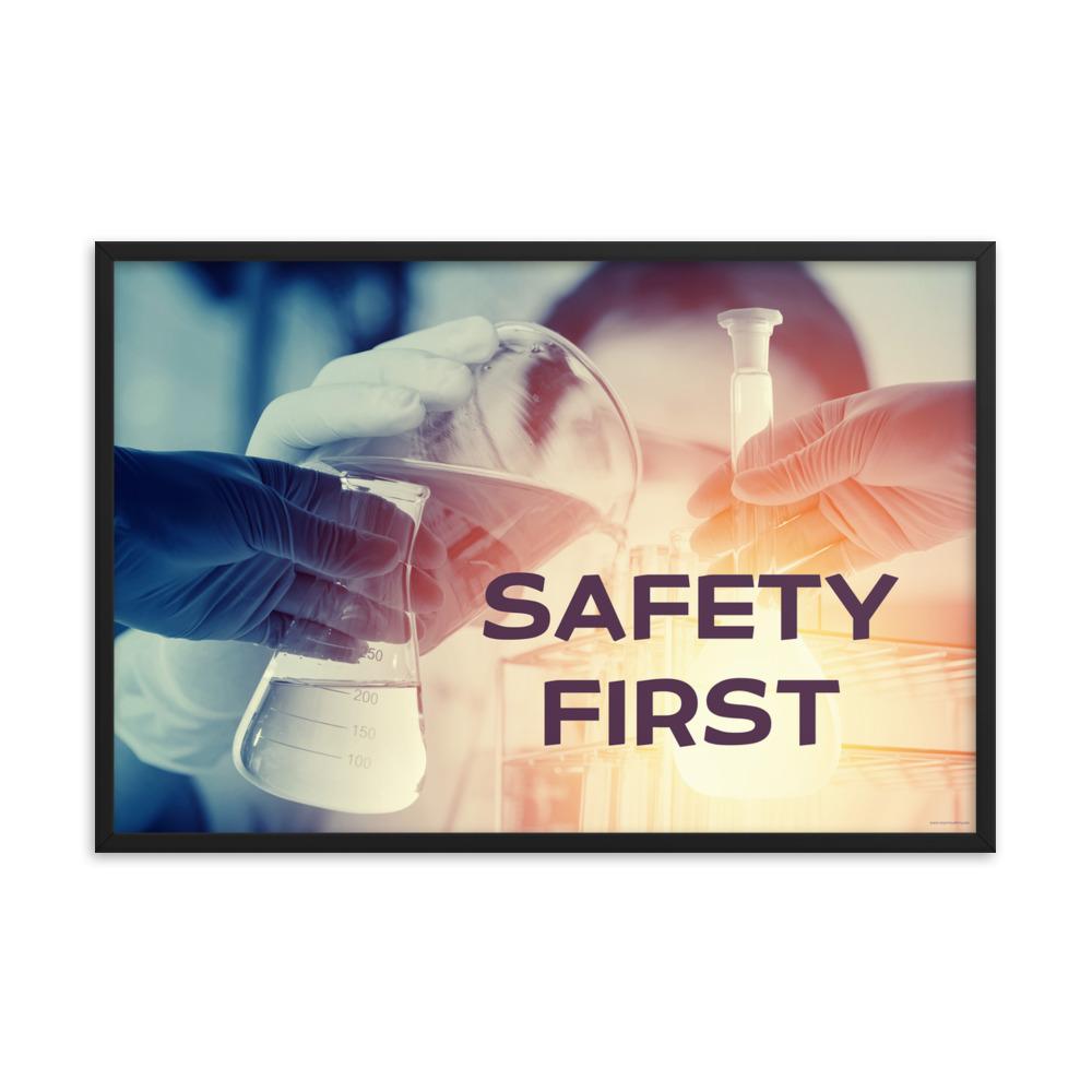 A safety poster showing a close-up of multiple gloved hands in a laboratory pouring substances into a beaker with the slogan safety first in the foreground.