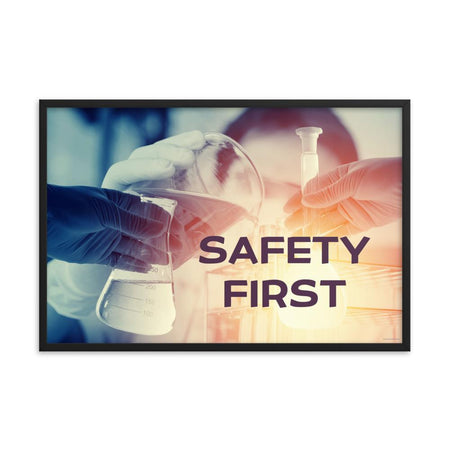 A safety poster showing a close-up of multiple gloved hands in a laboratory pouring substances into a beaker with the slogan safety first in the foreground.