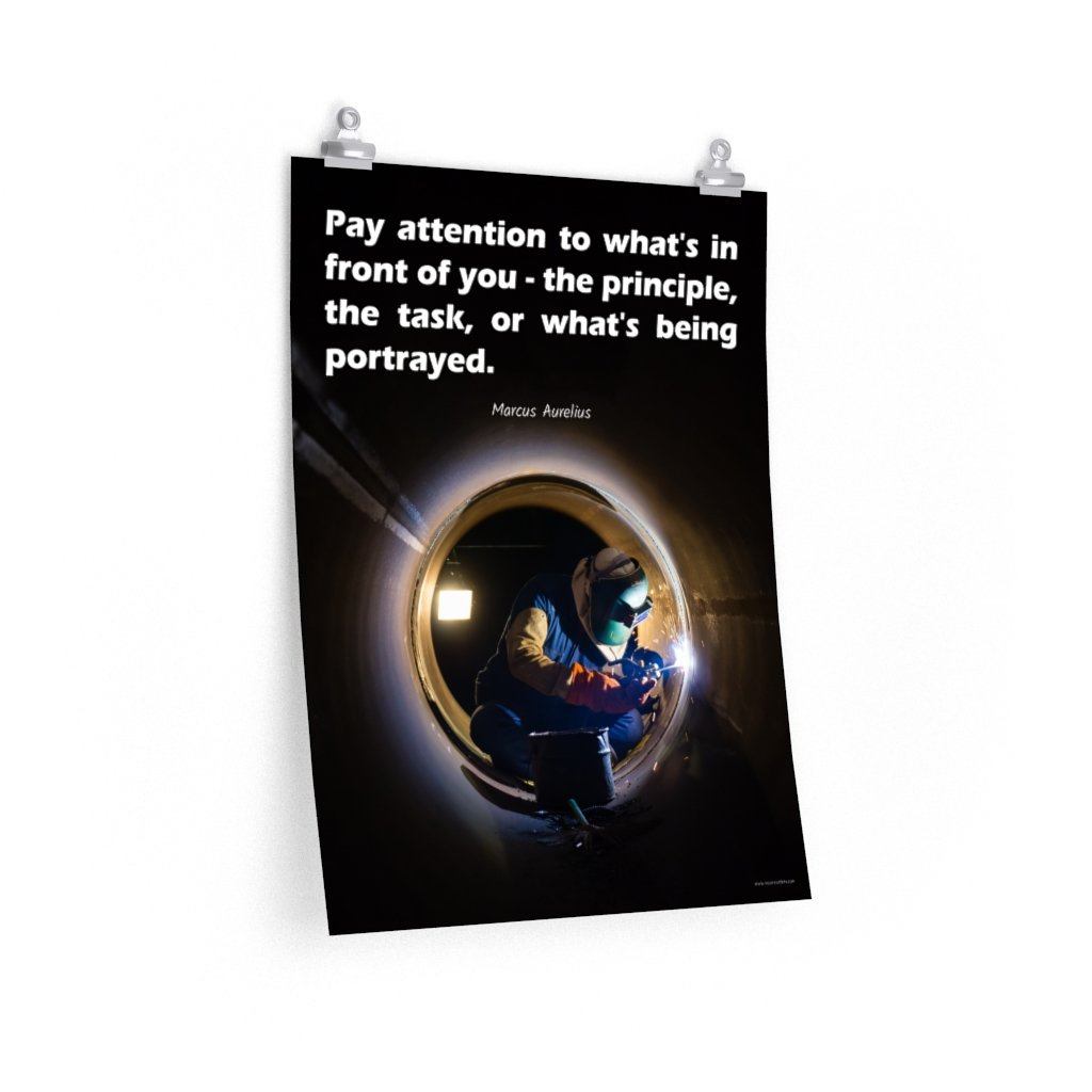 Safety poster of a welder in safety gear and hood sitting inside a large pipe; they are welding with bright sparks flying and a safety quote in white text at the top.