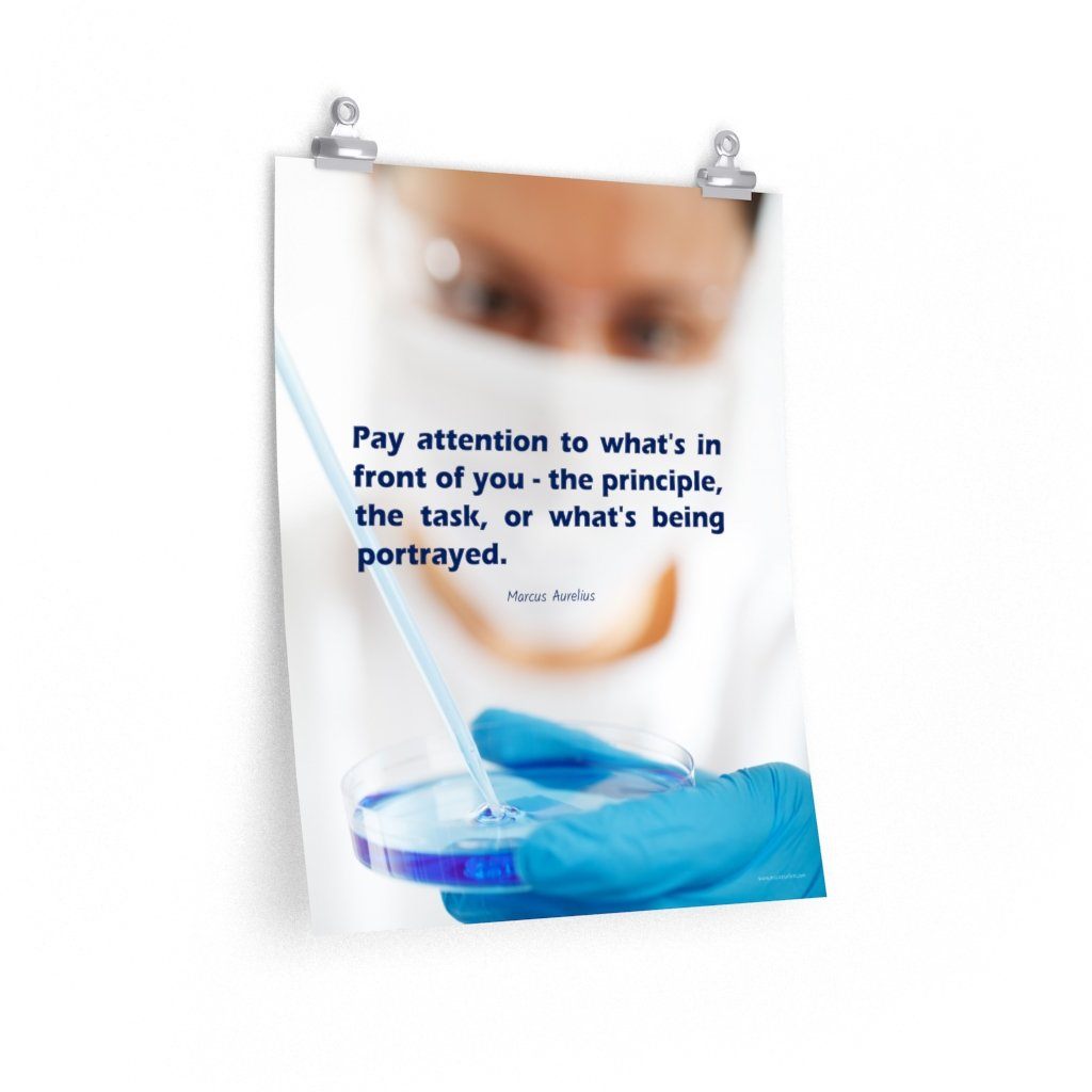 Safety poster showing a close up of a woman's face wearing safety glasses and a white face mask, holding a petri dish and pipette with a safety quote written in blue text.