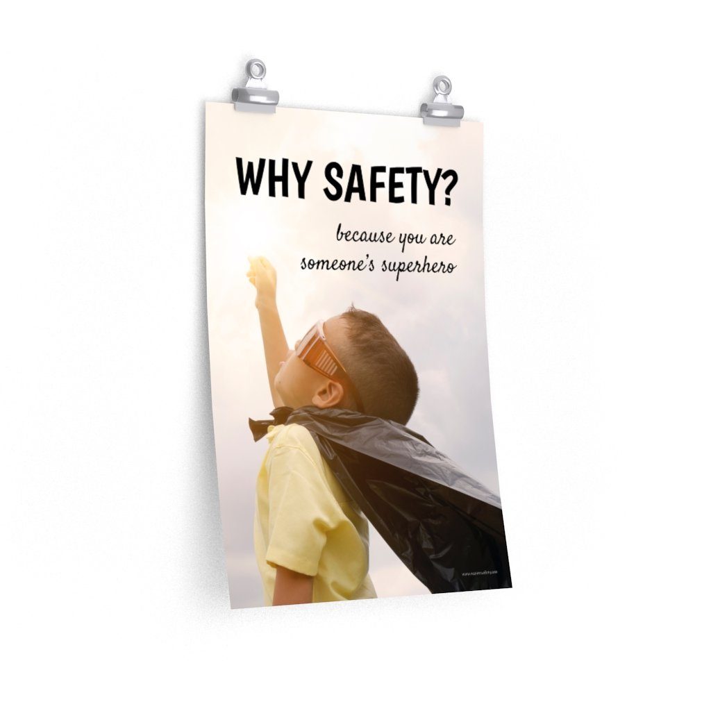 A workplace safety poster showing a young child with a makeshift cape and mask striking a superhero pose with the slogan why safety? because you are someone's superhero.