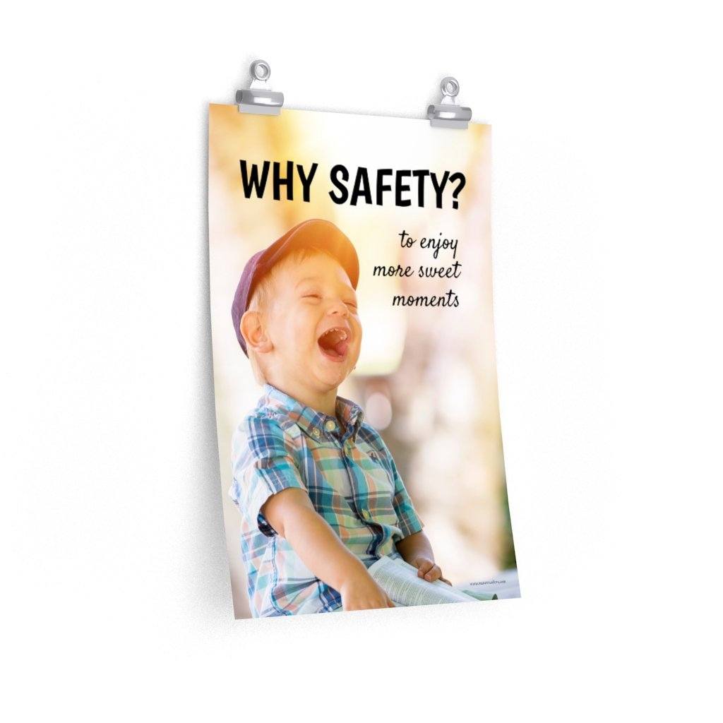 A workplace safety poster showing a young child laughing and smiling with whimsical camera flares around and the slogan why safety? to enjoy more sweet moments.