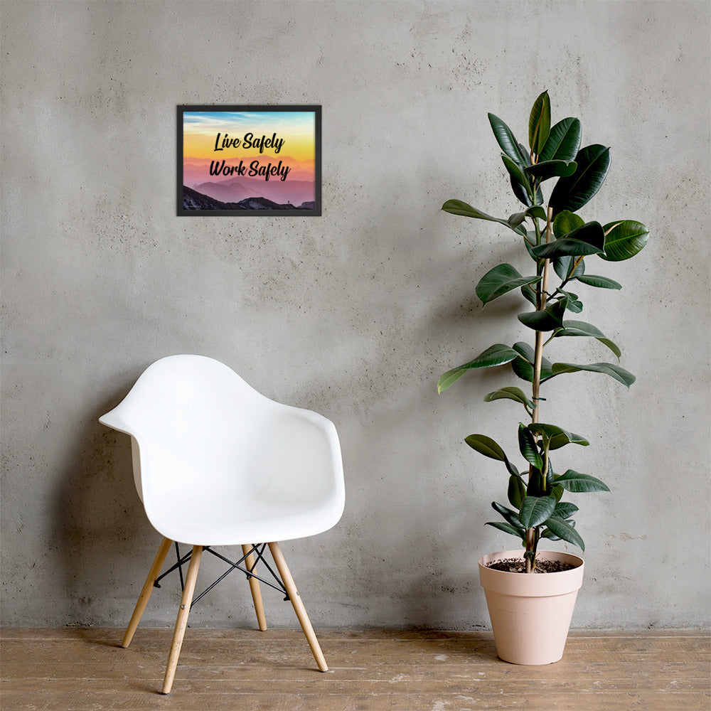 A safety poster showing a mountain range with a beautiful gradient in the sky of blue, yellow, and pink with the safety slogan "Live Safely Work Safely."
