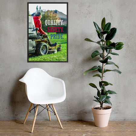 A workplace safety poster showing a man mowing a lawn on a sitting mower with the words quality, safety, pride in white, red, and blue, respectively.