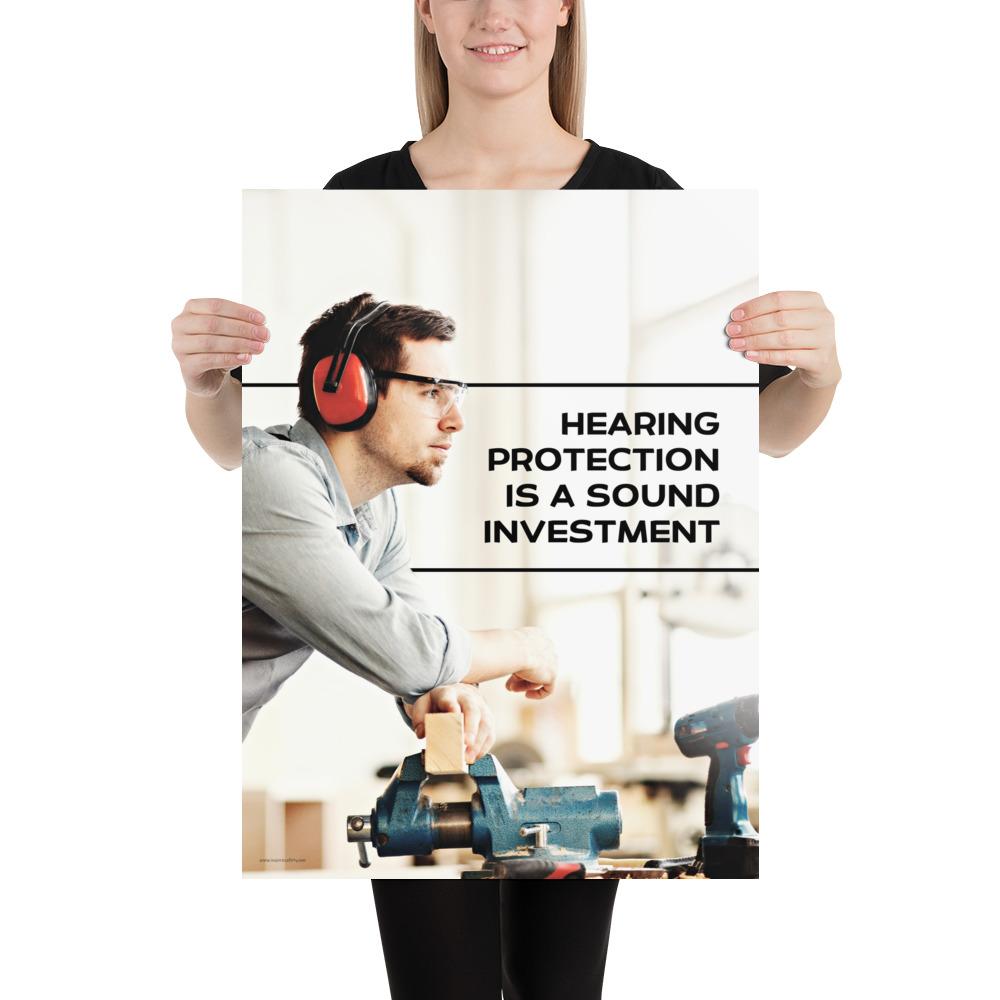 A workplace safety poster of a man in safety glasses and earmuffs taking a break in his woodshop with a safety slogan to the right.