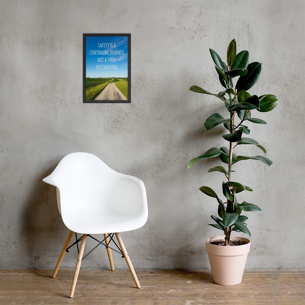 A workplace safety poster depicting a beautiful sunny day with a bright blue sky and a lush green field being cut down the middle by a dirt road leading off into the countryside with the text safety is a continuing journey, not a final destination.