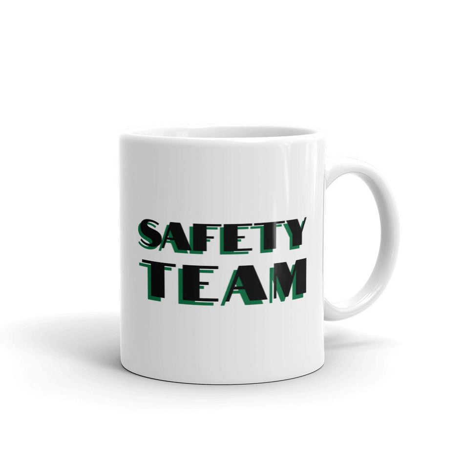 White ceramic mug with "Safety Team" in bold text across the side.