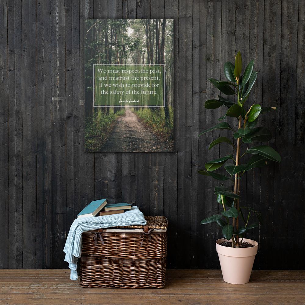 A workplace safety poster of a lush green forest with a footpath cutting directly in the middle winding down the forest with the a safety quote by Joseph Joubert centered on the poster.
