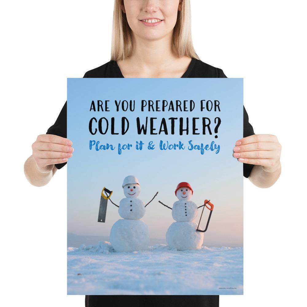 A safety poster showing two snowmen wearing hard hats and holding hand saws with the slogan are you prepared for cold weather? Plan for it and work safely.