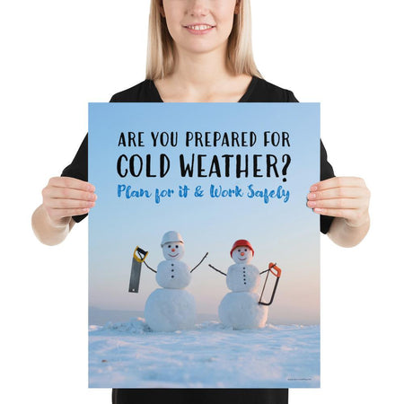 A safety poster showing two snowmen wearing hard hats and holding hand saws with the slogan are you prepared for cold weather? Plan for it and work safely.