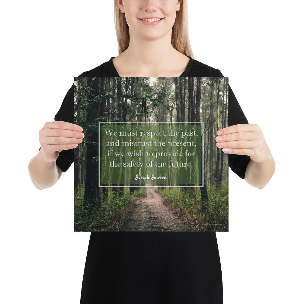 A workplace safety poster of a lush green forest with a footpath cutting directly in the middle winding down the forest with the a safety quote by Joseph Joubert centered on the poster.