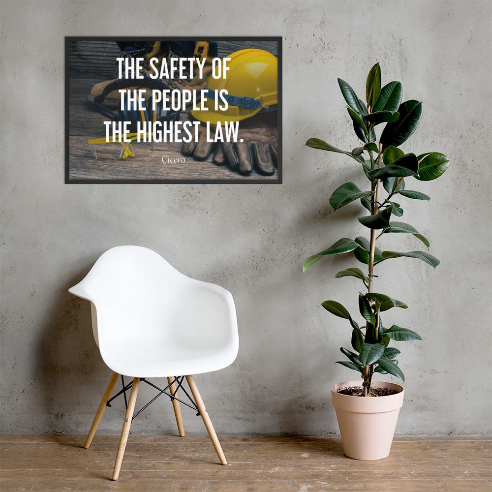 A safety poster showing a close-up of various PPE including safety glasses, ear muffs, gloves, a hard hat, and work boots with the quote by Cicero in the foreground.