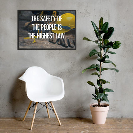 A safety poster showing a close-up of various PPE including safety glasses, ear muffs, gloves, a hard hat, and work boots with the quote by Cicero in the foreground.