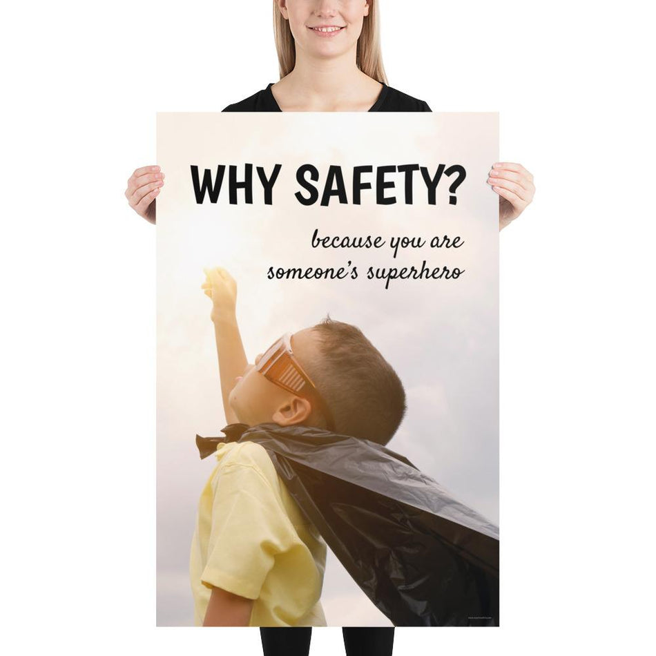 A workplace safety poster showing a young child with a makeshift cape and mask striking a superhero pose with the slogan why safety? because you are someone's superhero.