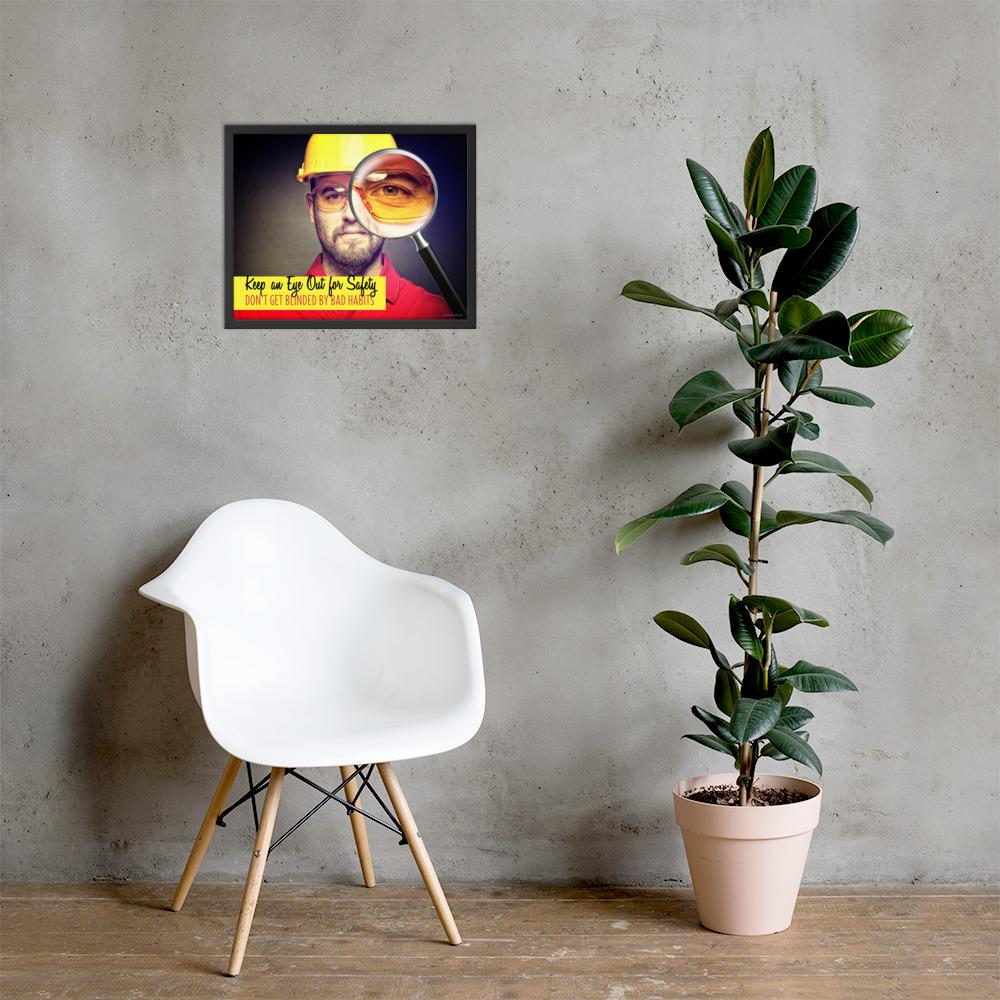 A workplace safety poster showing a portrait of a man wearing a hardhat and safety glasses with a magnifying glass magnifying one eye with the slogan, keep an eye out for safety, don't get blinded by bad habits.