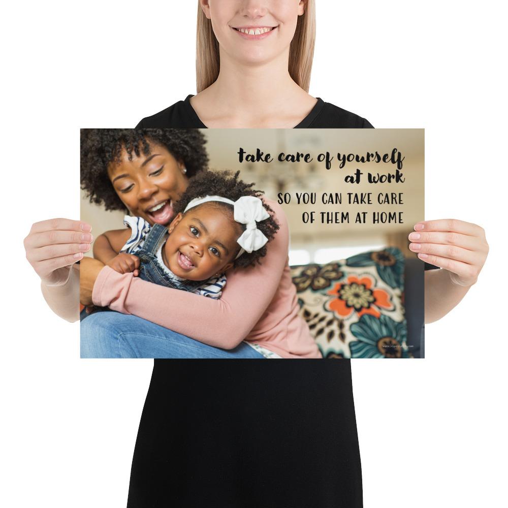 A safety poster showing a mother holding and playing with her young daughter at home with the slogan take care of yourself at work so you can take care of them at home.
