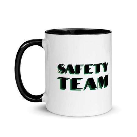 White ceramic mug with "Safety Team" in bold text across the side, with black color on the inside, the rim, and the handle.