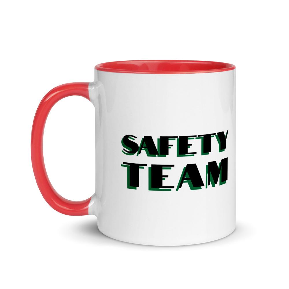 White ceramic mug with "Safety Team" in bold text across the side, with red color on the inside, the rim, and the handle.