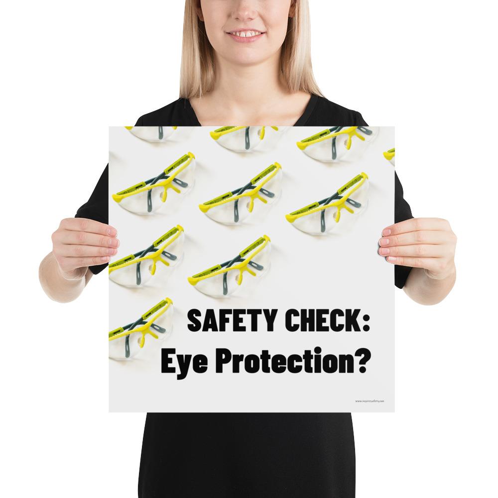 An eye safety poster depicting many clear safety glasses with yellow trim neatly lined up in rows and rows with a safety slogan in the foreground.