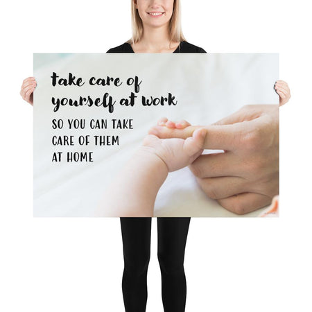 A safety poster showing a close-up of a baby's tiny hand wrapped around their parent's finger with the slogan take care of yourself at work so you can take care of them at home.