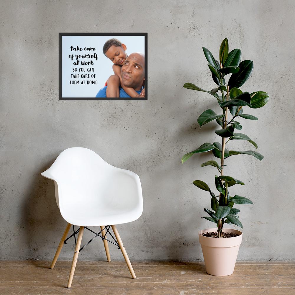 A safety poster showing a young boy sitting on his father's shoulders while they smile at each other with the slogan take care of yourself at work so you can take care of them at home.