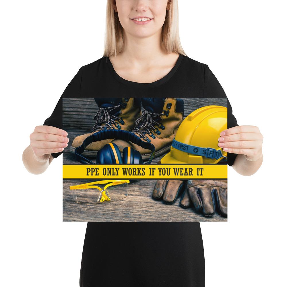 A safety poster showing a close-up of various PPE including safety glasses, ear muffs, gloves, a hard hat, and work boots with the slogan PPE only works if you wear it.