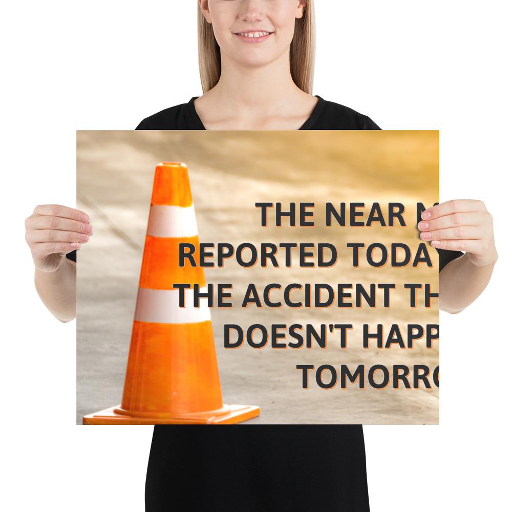 A workplace safety poster showing an orange safety cone with the slogan the near miss reported today is the accident that doesn't happen tomorrow.