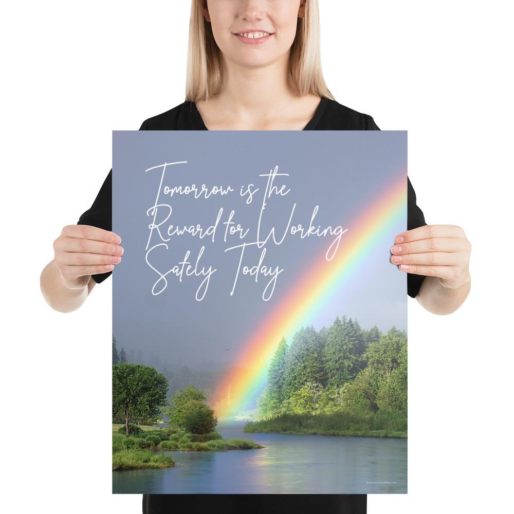A workplace safety poster showing bright forest scene with a lake and vibrant green trees and a colorful rainbow coming out of the forest with the slogan tomorrow is the reward for working safely today.