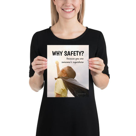 A workplace safety poster showing a young child with a makeshift cape and mask striking a superhero pose with the slogan why safety? because you are someone's superhero.