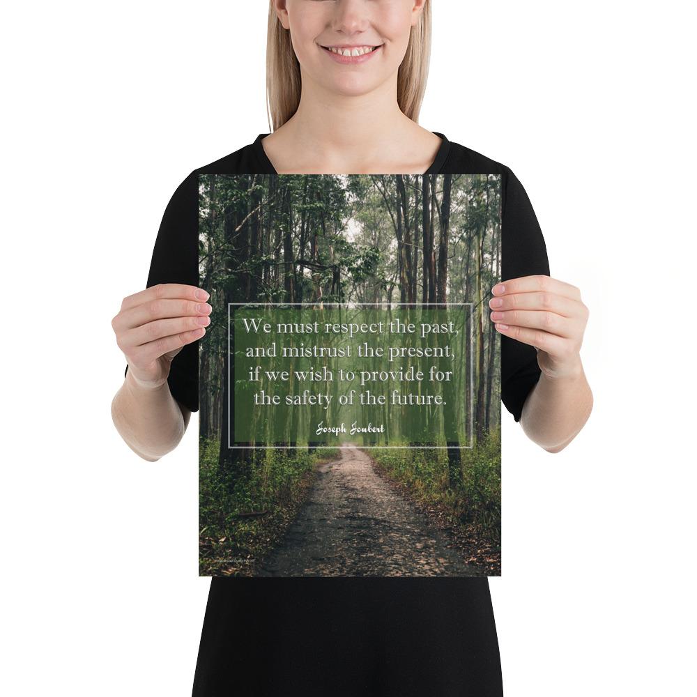A workplace safety poster of a lush green forest with a footpath cutting directly in the middle winding down the forest with the a safety quote by Joseph Joubert centered on the poster.