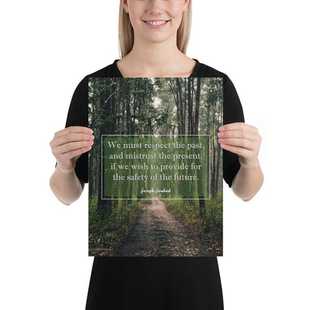 A workplace safety poster of a lush green forest with a footpath cutting directly in the middle winding down the forest with the a safety quote by Joseph Joubert centered on the poster.