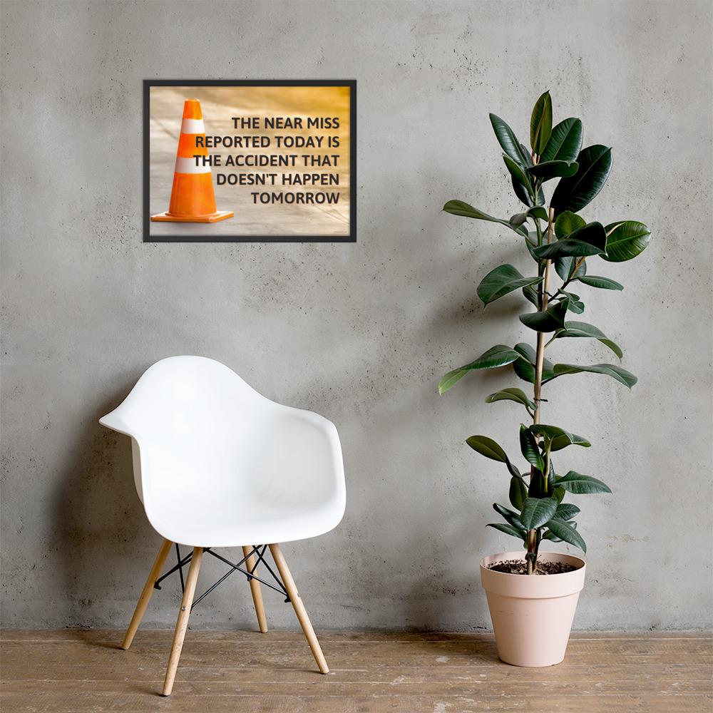 A workplace safety poster showing an orange safety cone with the slogan the near miss reported today is the accident that doesn't happen tomorrow.