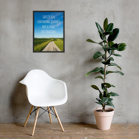 A workplace safety poster depicting a beautiful sunny day with a bright blue sky and a lush green field being cut down the middle by a dirt road leading off into the countryside with the text safety is a continuing journey, not a final destination.