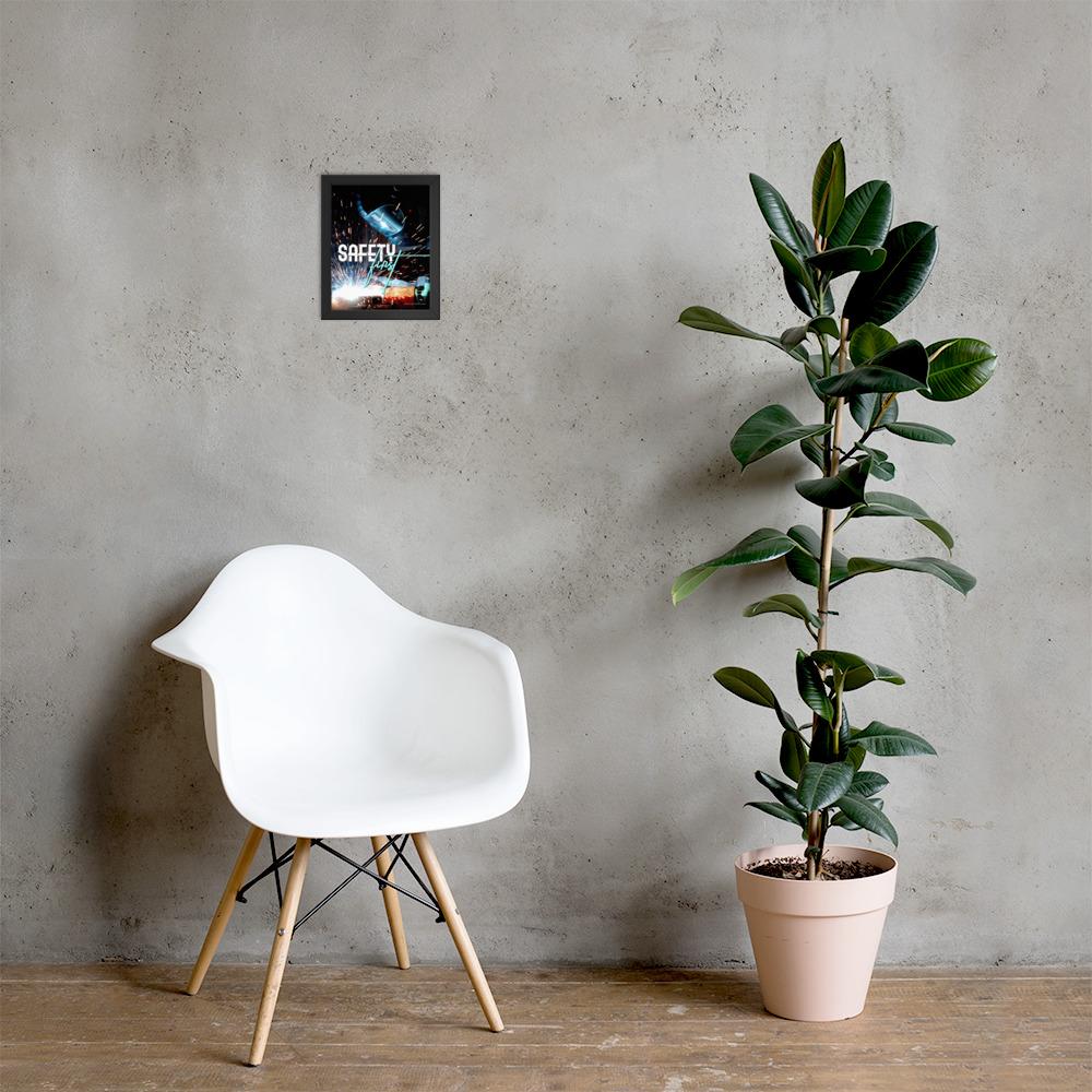A safety poster showing a close-up of a welder welding a pipe while wearing a welding hood with bright sparks flying all around with the slogan safety first.