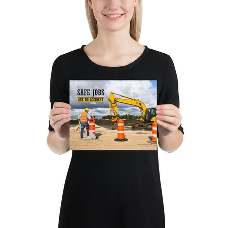A safety poster showing a construction worker on a worksite outside with a big excavator in the background and the slogan safe jobs are no accident against the bright blue sky.